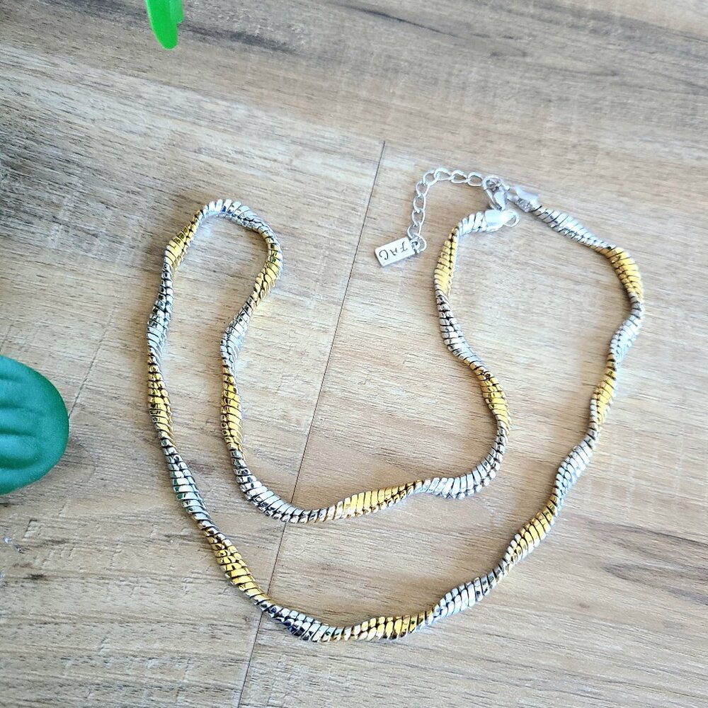 Fifth Avenue Collection gold and silver tone swirl chain.